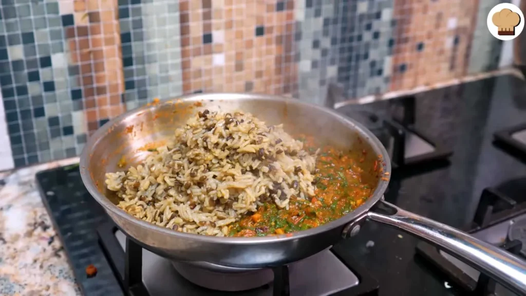 Mixing Rice and Urad Dal with Masala 